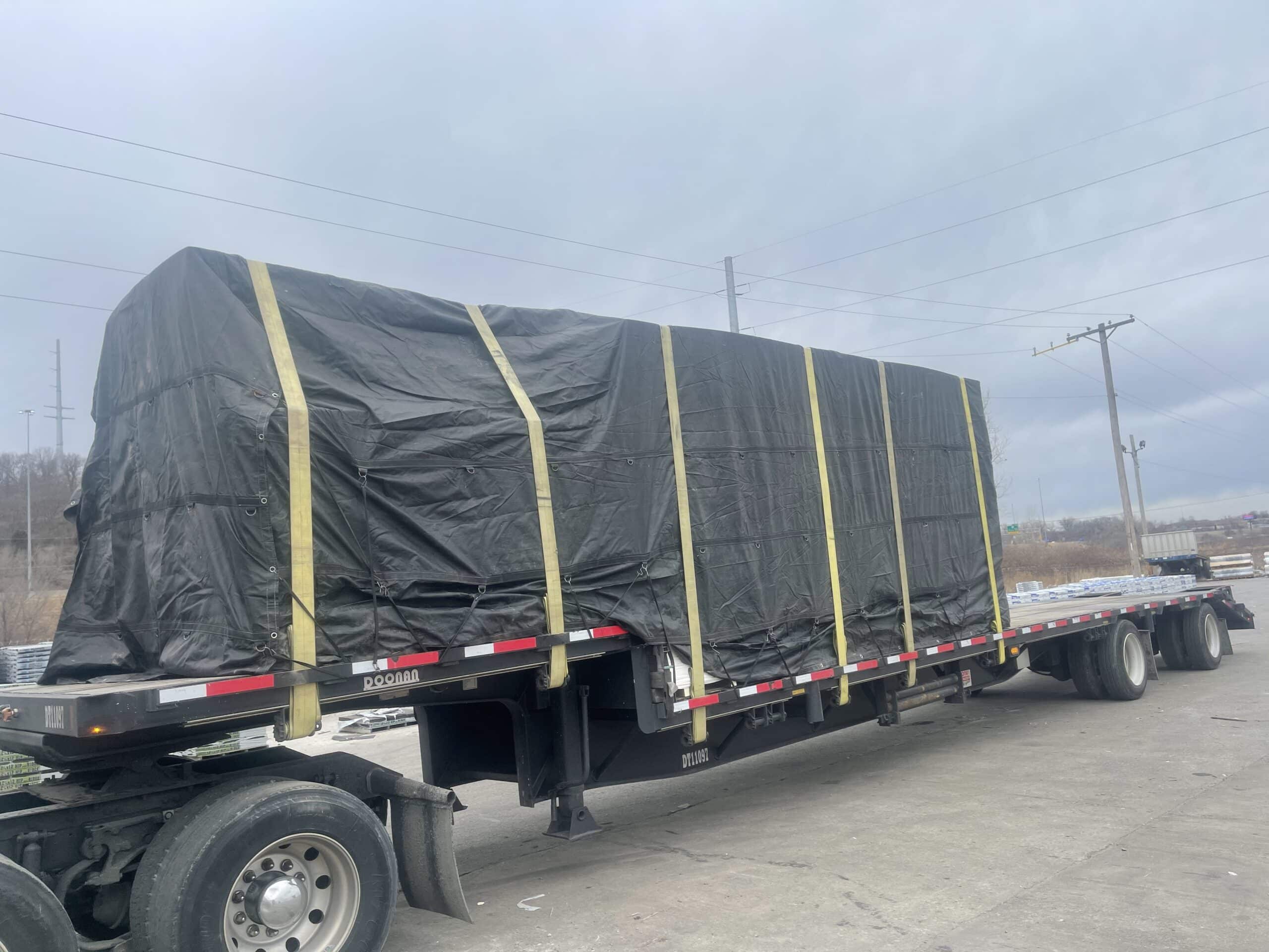 load on step deck trailer with tarp