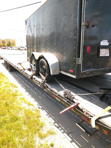 enclosed trailer on a trailer