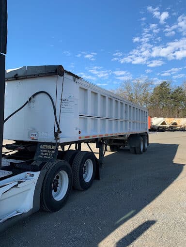 Shipping a 2012 Dump Trailer with Heavy Equipment Transport