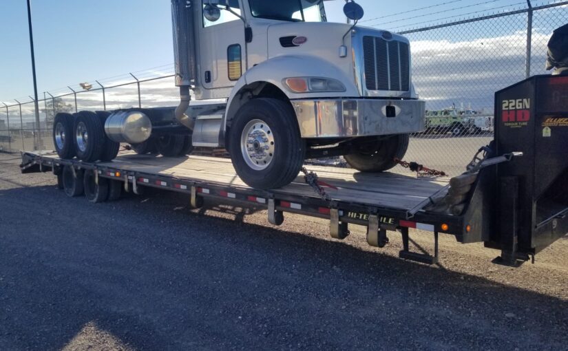 How to Load an Inoperable Semi Truck on a Trailer