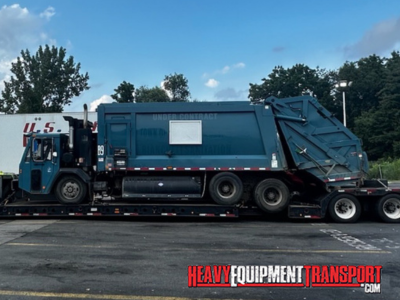 transporting a 2019 Crane Carrier LET 2 Garbage Truck