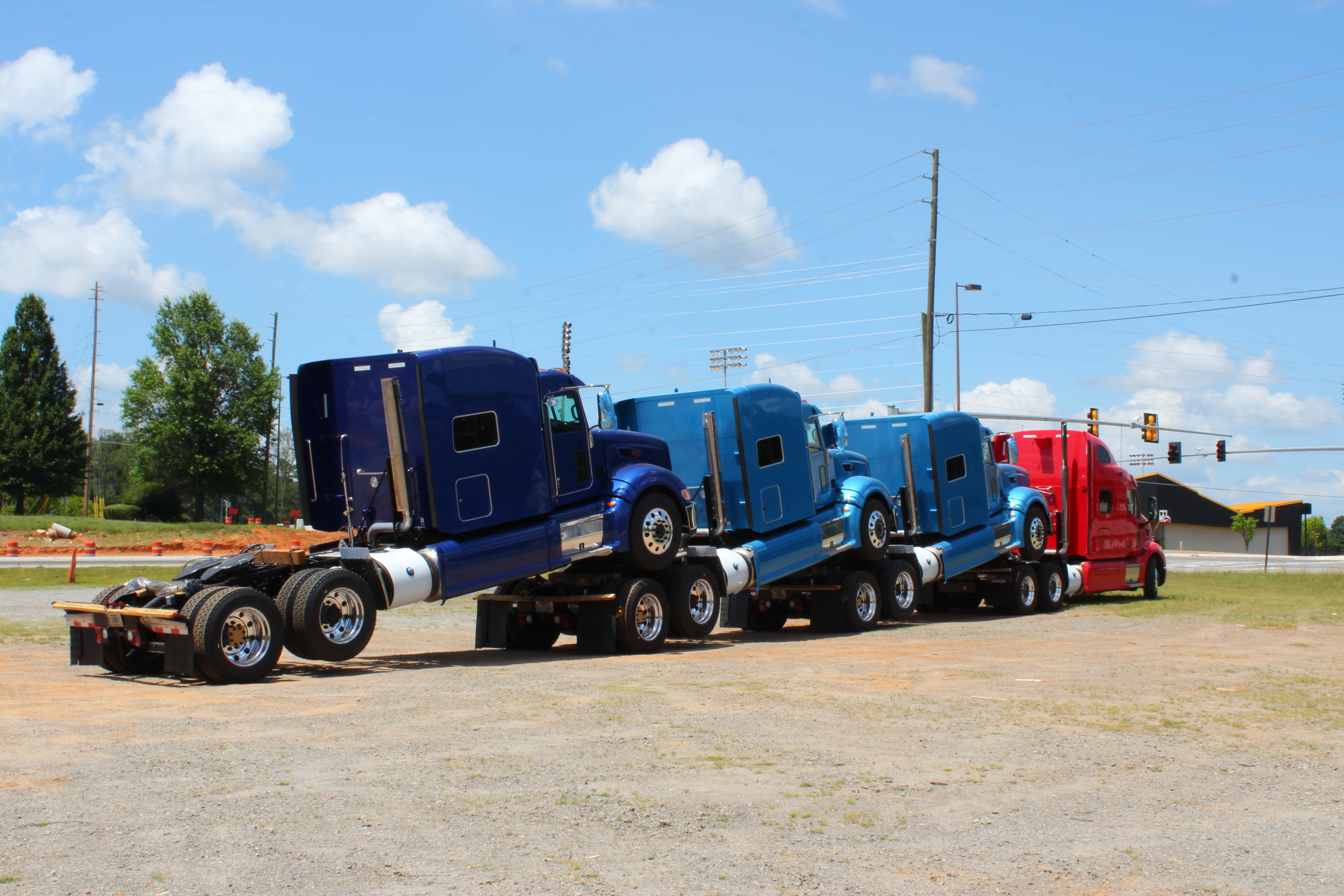 3 trucks piggybacking