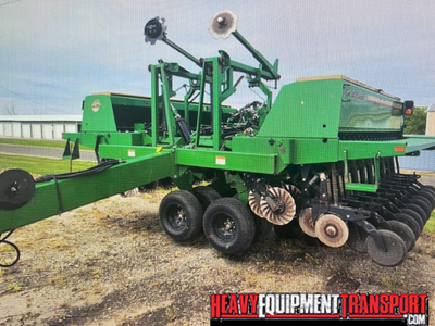 Transporting a Great Plains 2410NT planter.