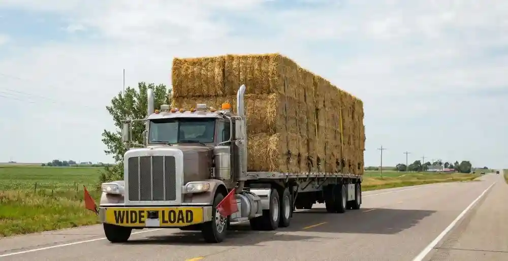 Straw bale truck transport