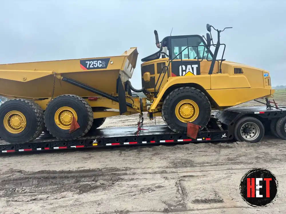 Hauling a CAT 752C2 articulated dump truck
