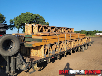 Shipping 88 wood floor trusses.