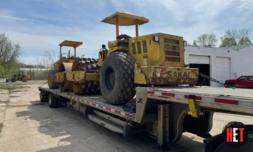 Transporting two road rollers