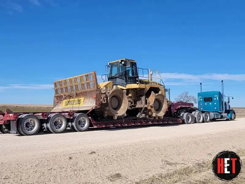 CAT 826G Landfill Compactor being transported