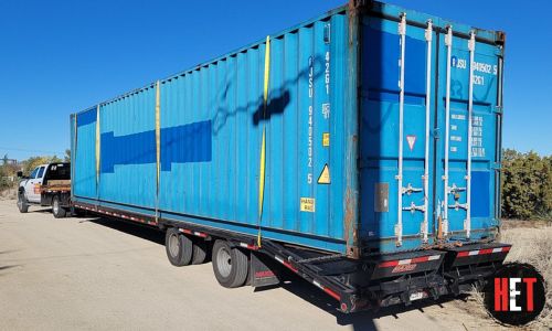 Container transported by semi truck.