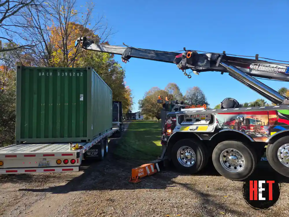 Crane loading a 20ft container