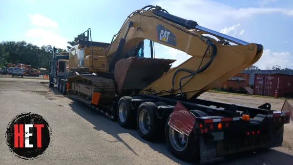 hauling a 2015 CAT 336 Fl Excavator