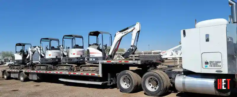 Transporting mini excavators