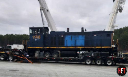 Transporting a locomotive engine.