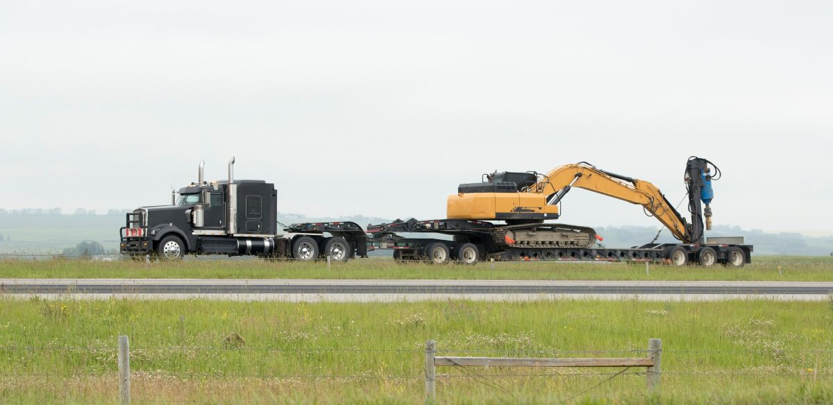 Transporting an excavator