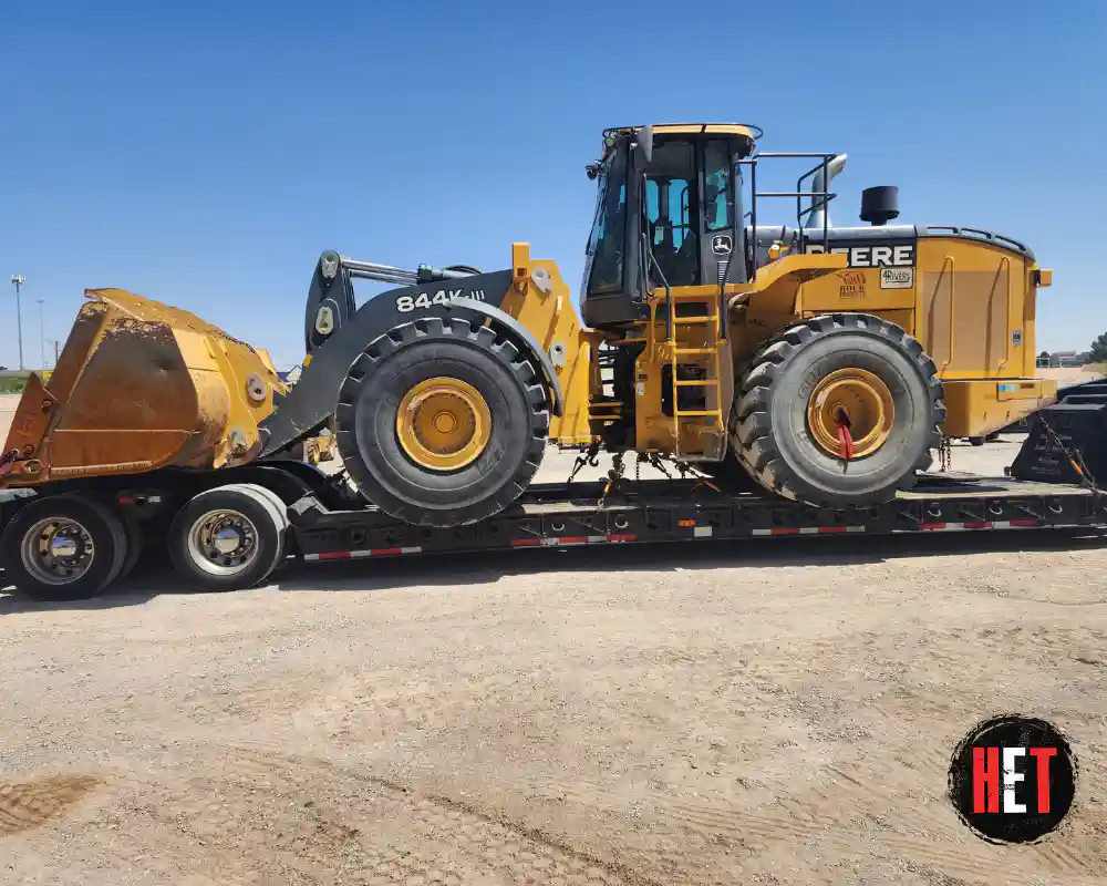 Hauling a 2014 John Deere wheel loader