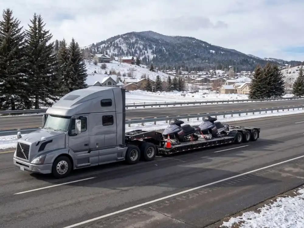 Transporting 2 snowmobiles